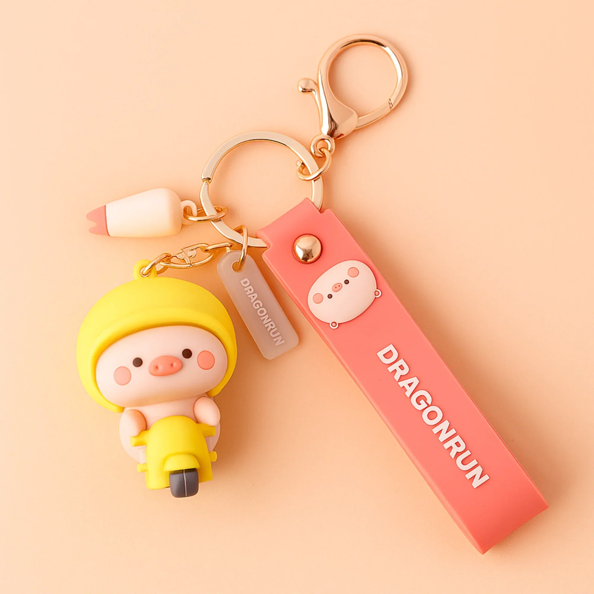 Piggy on Yellow Scooter Silicone Keyring