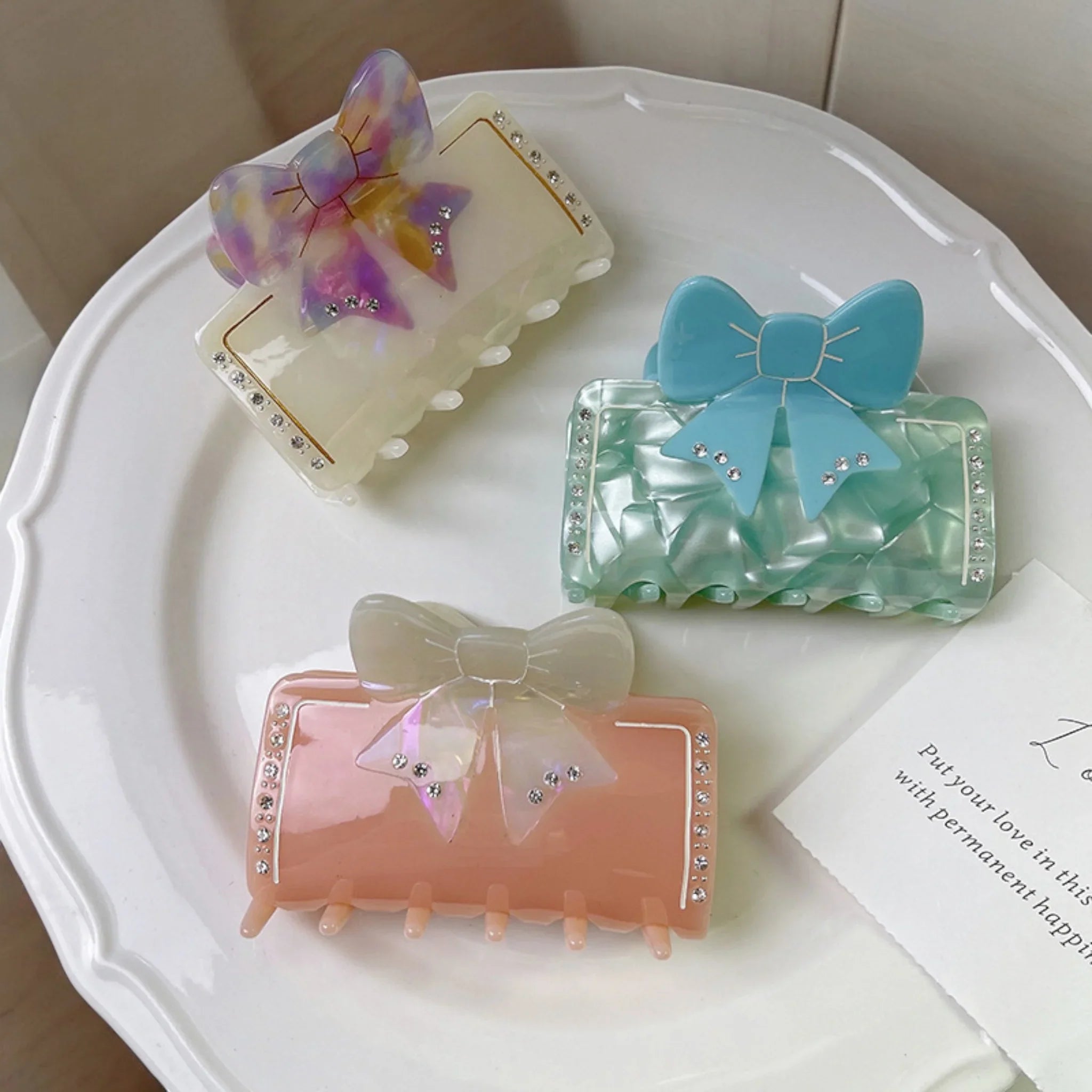 White Marble Effect Claw Clip with Pink Bow