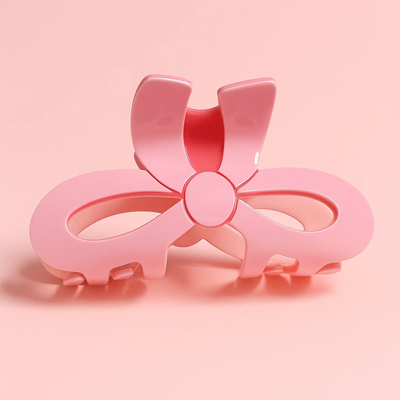 Pink Bow Shaped Solid Claw Clip