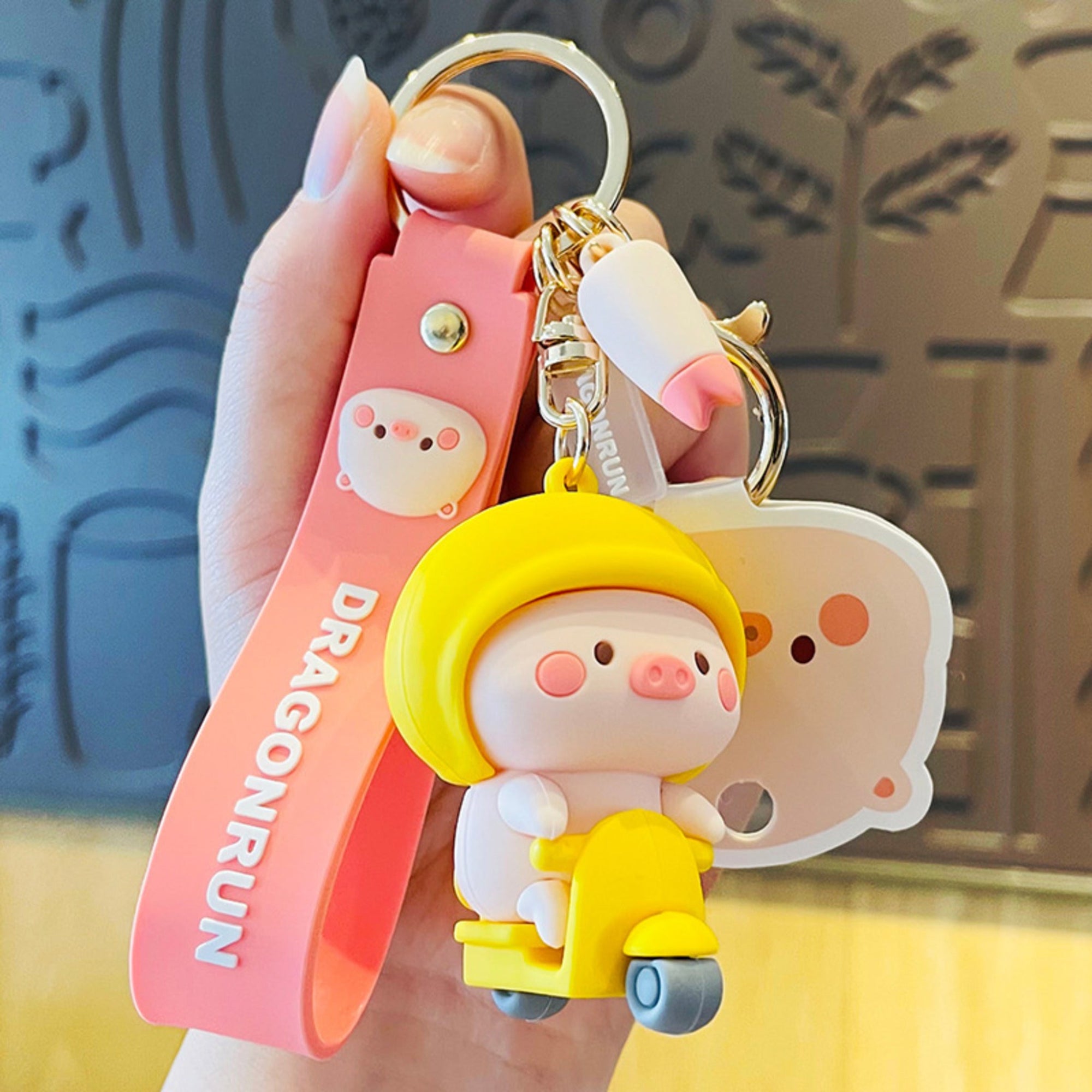 Piggy on Yellow Scooter Silicone Keyring